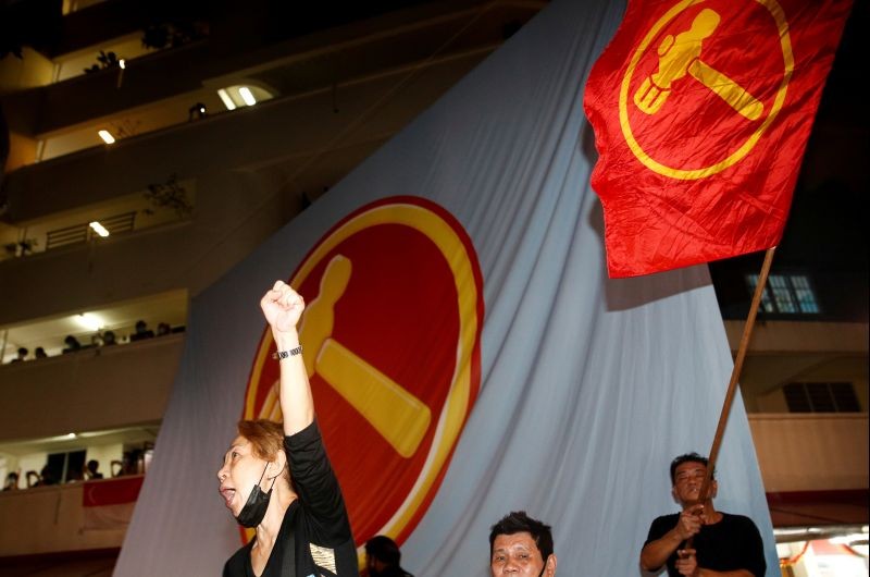 Opposition Workers' Party supporters celebrate the results of the general election in Singapore on July 11, 2020. (REUTERS Photo)