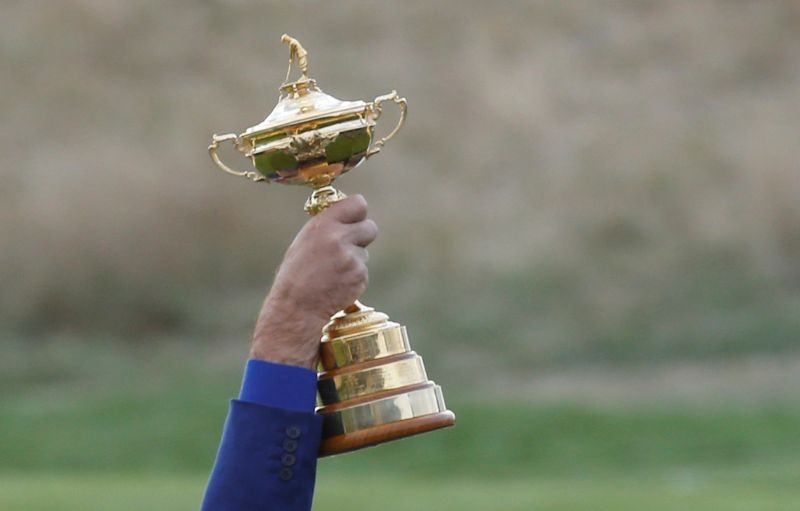 General view as Team Europe captain Thomas Bjorn lifts the trophy as they celebrate after winning the Ryder Cup REUTERS/Regis Duvignau/File Photo