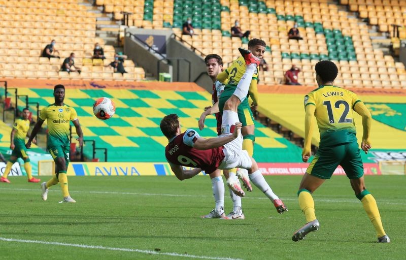Burnley's Chris Wood scores their first goal, as play resumes behind closed doors following the outbreak of the coronavirus disease (COVID-19) Lindsey Parnaby/Pool via REUTERS