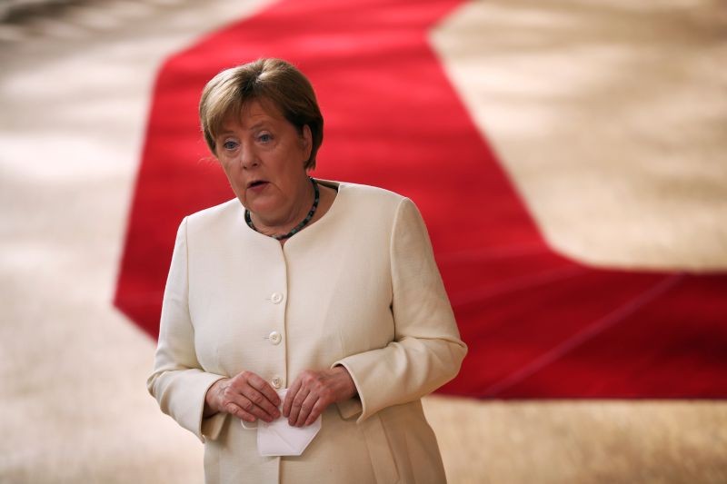 German Chancellor Angela Merkel makes a statement as she arrives for the first face-to-face EU summit since the coronavirus disease (COVID-19) outbreak, in Brussels, Belgium on July 19, 2020. (REUTERS Photo)