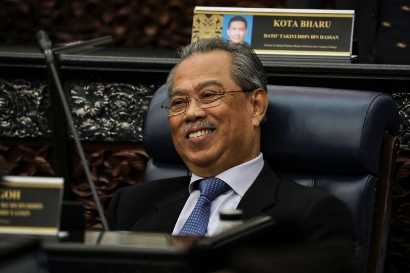 Malaysia's Prime Minister Muhyiddin Yassin smiles during a session of the lower house of parliament, in Kuala Lumpur, Malaysia on July 13, 2020. (REUTERS Photo)
