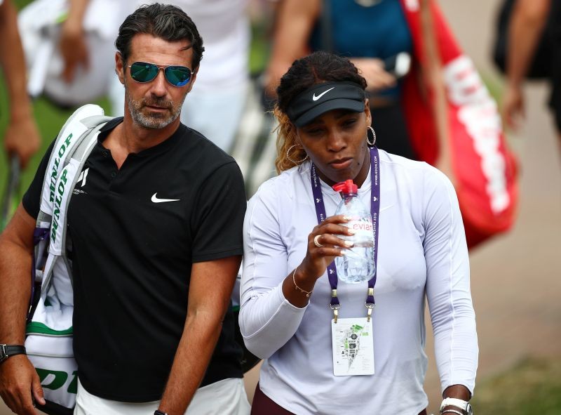 Serena Williams of the U.S. with her coach, Patrick Mouratoglou, before practice REUTERS/Hannah McKay/File photo