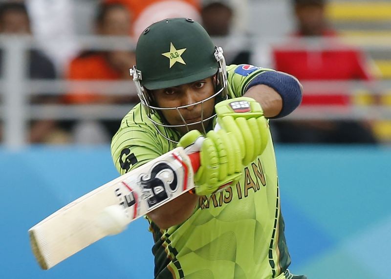 Pakistan's Umar Akmal hits a four during their Cricket World Cup match against South Africa in Auckland, March 7, 2015. REUTERS/Nigel Marple/File Photo