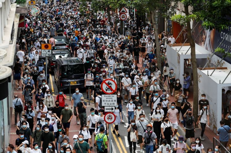 Anti-national security law protesters march at the anniversary of Hong Kong's handover to China from Britain, in Hong Kong, China on July 1, 2020. (REUTERS Photo)