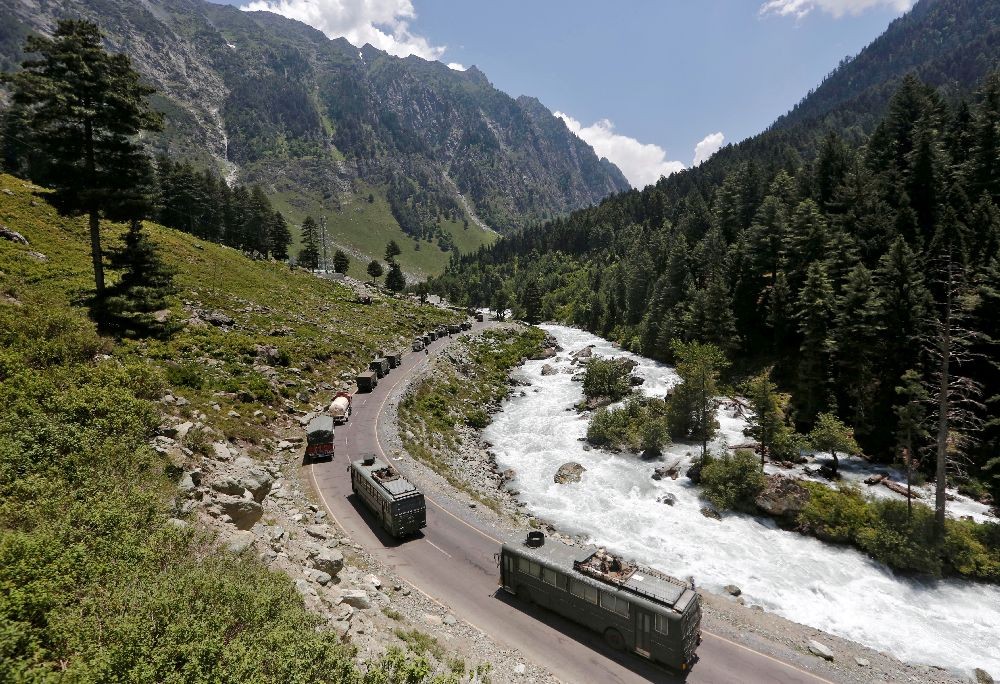 An Indian Army convoy moves along a highway leading to Ladakh, at Gagangeer in Kashmir's Ganderbal district June 18, 2020. REUTERS/Danish Ismail/Files