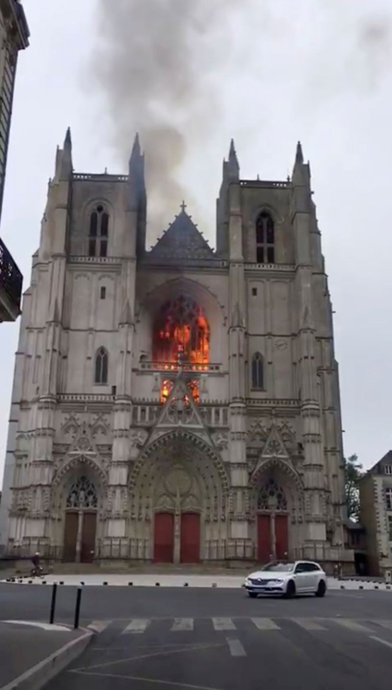 General view of fire at the Cathedral of Saint Pierre and Saint Paul in Nantes, in Nantes, France on  July 18, 2020 in this picture grab obtained from a social media video. (REUTERS File Photo)