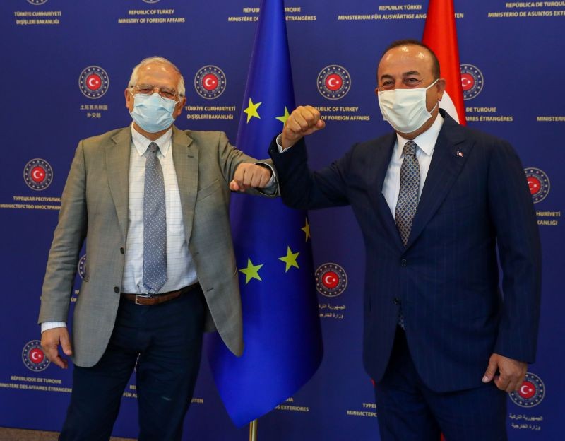 Turkish Foreign Minister Mevlut Cavusoglu and Josep Borrell Fontelles, High Representative of the European Union for Foreign Affairs and Security Policy, both wearing protective face masks, pose before their meeting in Ankara, Turkey on July 6, 2020. (REUTERS Photo)