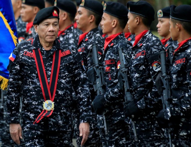 Philippine President Rodrigo Duterte, wearing a military uniform, reviews scout ranger troops upon his arrival during the 67th founding anniversary of the First Scout Ranger regiment in San Miguel town, Bulacan province, north of Manila, Philippines on November 24, 2017. (REUTERS File Photo)