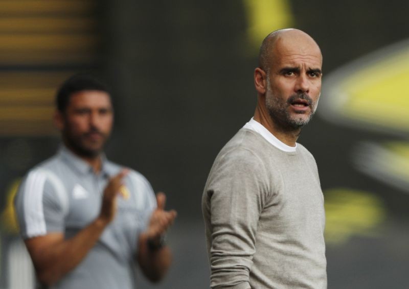 Manchester City manager Pep Guardiola, as play resumes behind closed doors following the outbreak of the coronavirus disease (COVID-19) Pool via REUTERS/Adrian Dennis