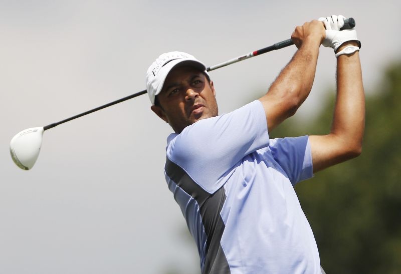 Arjun Atwal of India tees off on the second hole during the second round of The Barclays golf tournament in Edison, New Jersey August 26, 2011. REUTERS/Jessica Rinaldi/Files