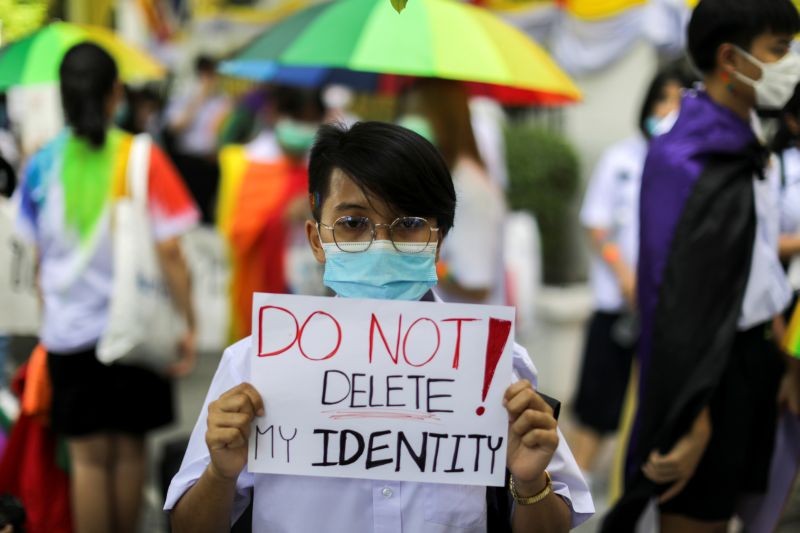 A member of a youth pride student group holds a placard before a rally for gender rights in Bangkok, Thailand on July 29. (REUTERS Photo)
