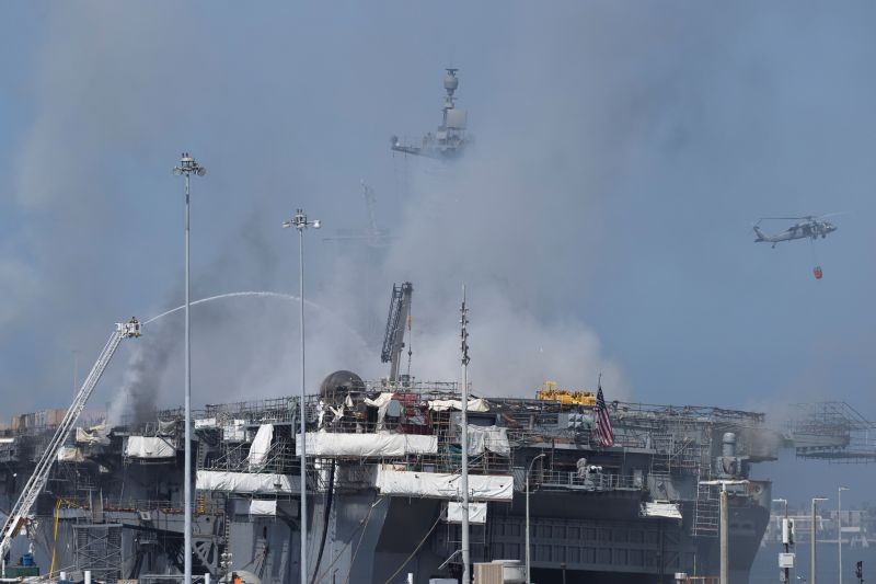 U.S. Navy helicopters and city firefighters continue fighting a fire on the amphibious assault ship USS Bonhomme Richard at Naval Base San Diego, in San Diego, California, US on July 13, 2020. (REUTERS Photo)