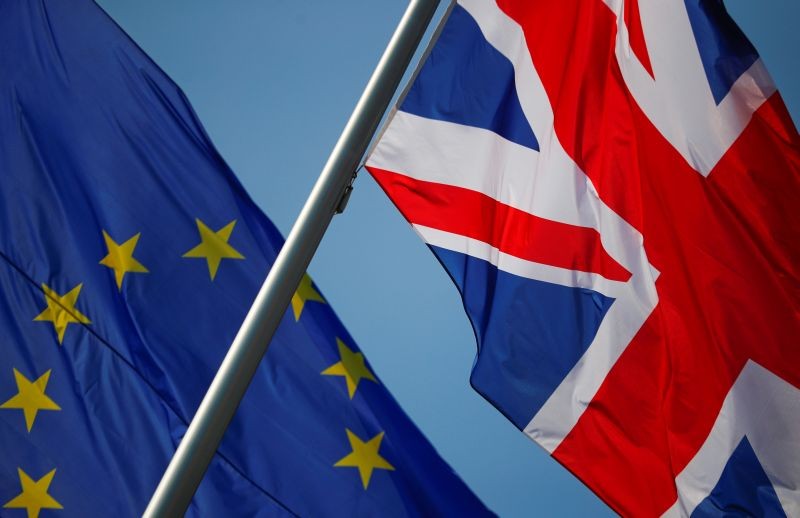 European Union and British flags flutter in front of a chancellery ahead of a visit of British Prime Minister Theresa May in Berlin, Germany on April 9, 2019. (REUTERS File Photo)