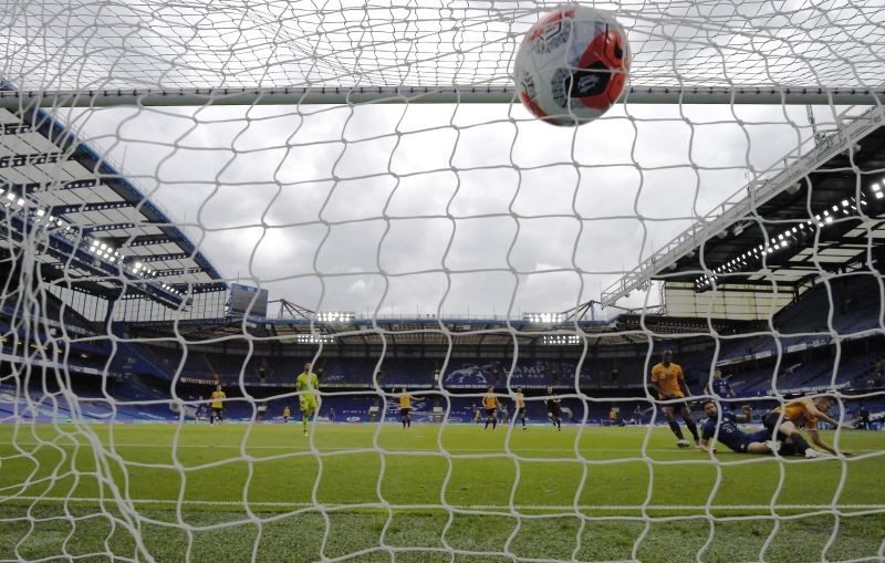 Chelsea's Olivier Giroud scores their second goal, as play resumes behind closed doors following the outbreak of the coronavirus disease (COVID-19) Pool via REUTERS/Daniel Leal-Olivas