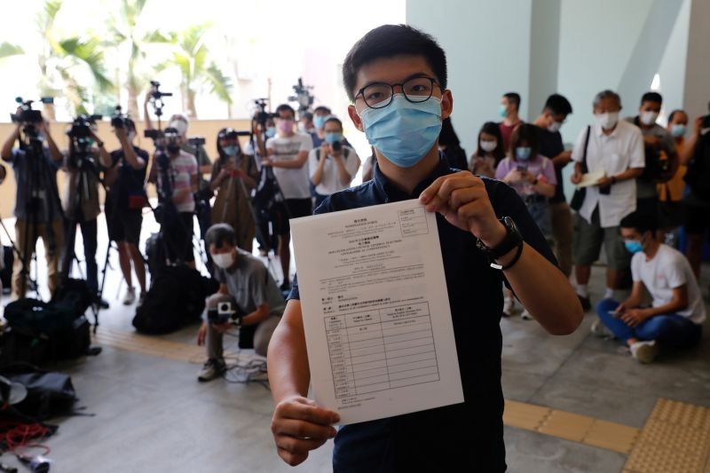 Pro-democracy activist Joshua Wong registers as a candidate for the upcoming Â Legislative Council election in Hong Kong, China on July 20. (REUTERS Photo)