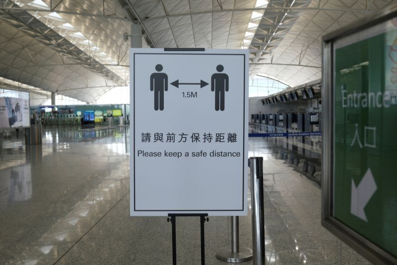 A social distancing sign is seen at the Hong Kong International Airport, following the coronavirus disease (COVID-19) outbreak, in Hong Kong, China on May 7, 2020. (REUTERS File Photo)