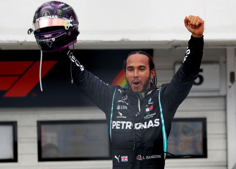 Formula One F1 - Hungarian Grand Prix - Hungaroring, Budapest, Hungary - July 19, 2020 Mercedes' Lewis Hamilton celebrates winning the race REUTERS/Leonhard Foeger/Pool