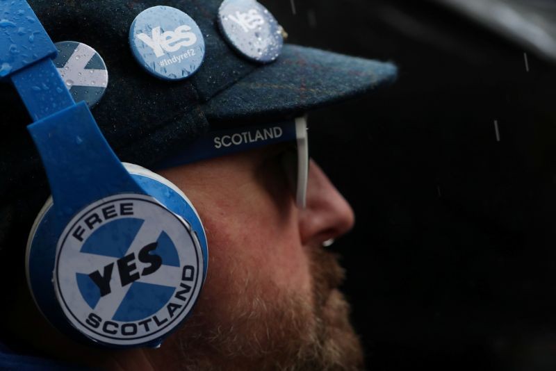 A man wears headphones as demonstrators march for Scottish Independence through Glasgow City centre, Scotland, Britain on January 11, 2020. (REUTERS File Photo)