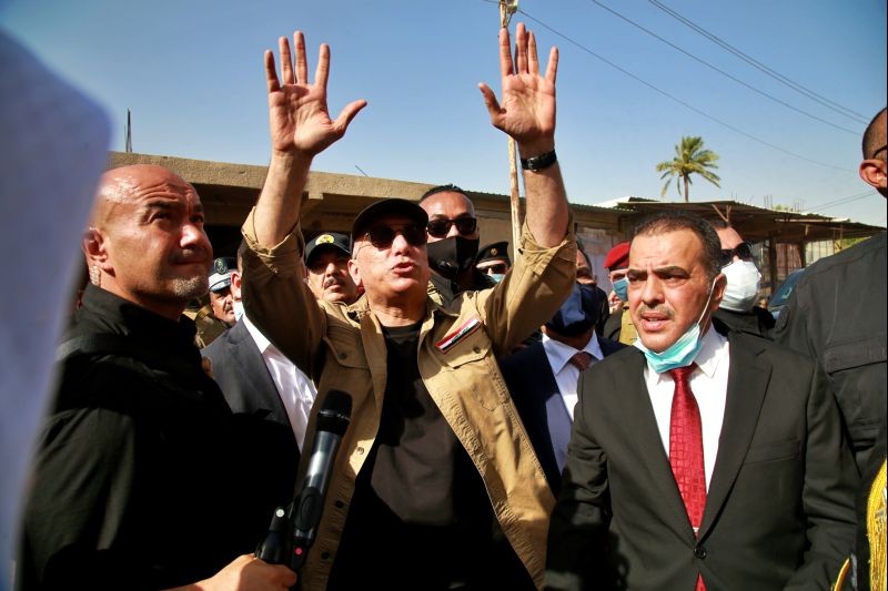 Iraqi Prime Minister Mustafa al-Kadhimi speaks to locals in Tarmiyah, Iraq on July 20, 2020. (REUTERS Photo)
