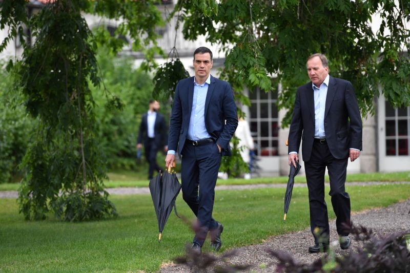 Spanish Prime Minister Pedro Sanchez and Sweden's Prime Minister Stefan Lofven walk during their meeting, amid the spread of the coronavirus disease (COVID-19), in Harpsund, Sweden on July 15. (REUTERS Photo)