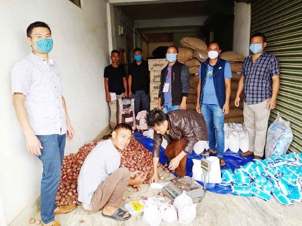 Member of All Nagaland Taxi Association, Wokha unit during the distribution of relief on July 4. (Photo Courtesy: ANTA Wokha)