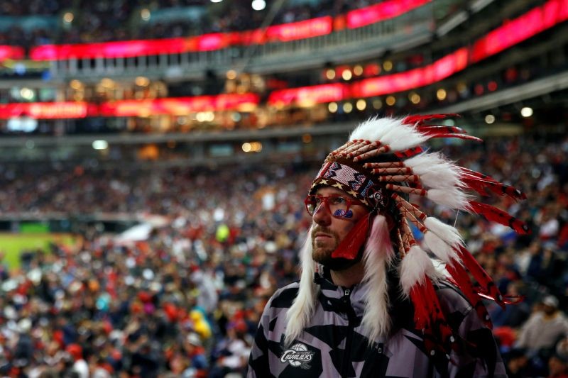 A fan of the Major League Baseball team Cleveland Indians watches their World Series game against the Chicago Cubs during a watch party inside Progressive Field in Cleveland, Ohio U.S., October 30, 2016. REUTERS/Shannon Stapleton/Files