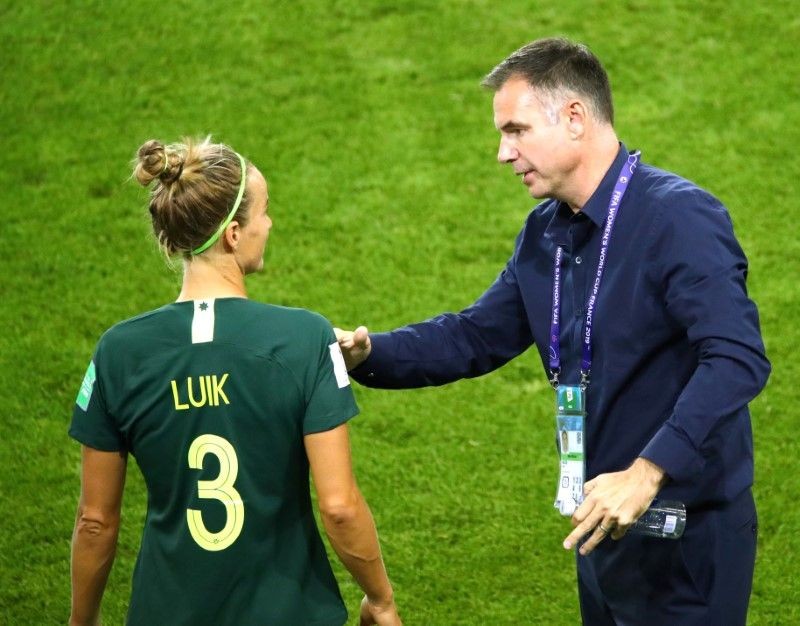 Australia coach Ante Milicic speak to Aivi Luik before she comes on as a substitute REUTERS/Denis Balibouse/Files