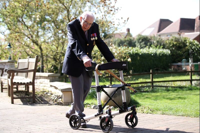 Retired British Army Captain Tom Moore, 99, walks to raise money for health workers, by attempting to walk the length of his garden one hundred times before his 100th birthday this month as the spread of coronavirus disease (COVID-19) continues, Marston Moretaine, Britain on April 15, 2020. (REUTERS File Photo)
