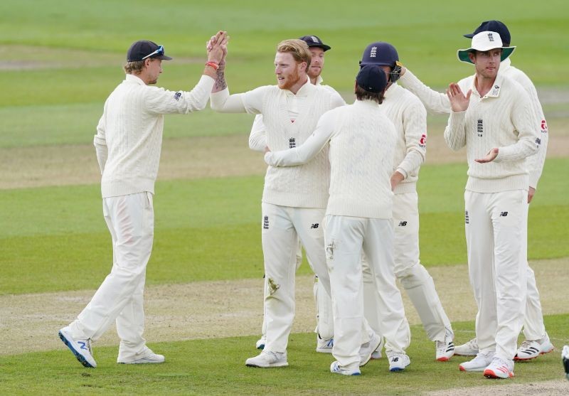England's Ben Stokes celebrates the wicket of West Indies' Jermaine Blackwood with teammates, as play resumes behind closed doors following the outbreak of the coronavirus disease (COVID-19) Jon Super/Pool via REUTERS