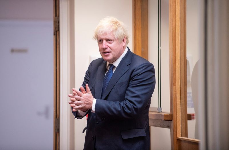 Britain's Prime Minister Boris Johnson gestures as he visits St Joseph's Catholic School, as the coronavirus disease (COVID-19) outbreak continues, in Upminster, London, Britain on August 10. (REUTERS Photo)