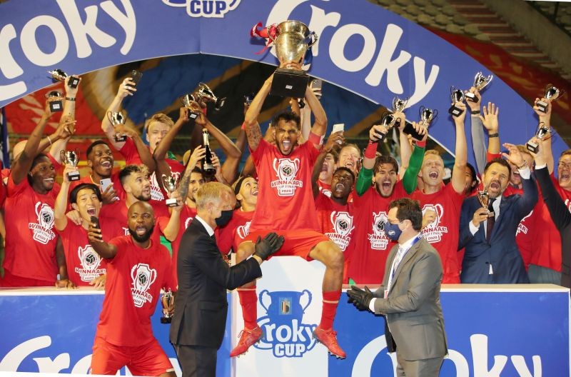 Royal Antwerp players celebrate with the trophy after winning the Belgian Cup Bart Vandenbroucke/Pool via REUTERS