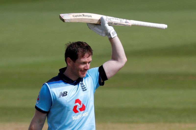 England's Eoin Morgan celebrates his century, as play resumes behind closed doors following the outbreak of the coronavirus disease (COVID-19) Adrian Dennis/Pool via REUTERS