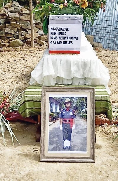 Rifleman Methna Konyak was laid to rest amid a solemn wreath laying and gun salute by a guard of honour in his native town at Mon on August 1. (Photo Courtesy: HQ IGAR-North)