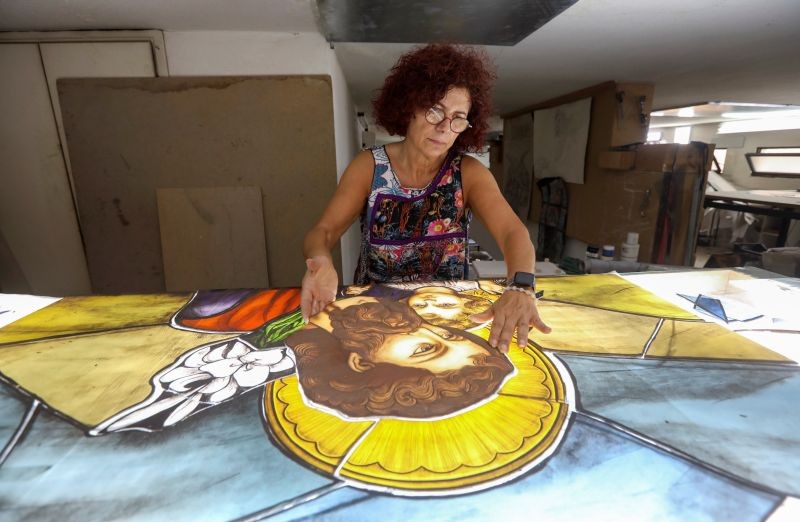 Stained glass maker Maya Husseini works inside her workshop in Hazmiyeh, Lebanon on August 13, 2020. (REUTERS Photo)