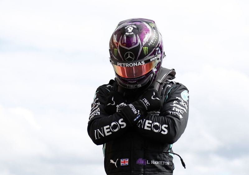 Mercedes' Lewis Hamilton celebrates after qualifying in pole position Pool via REUTERS/Francois Lenoir