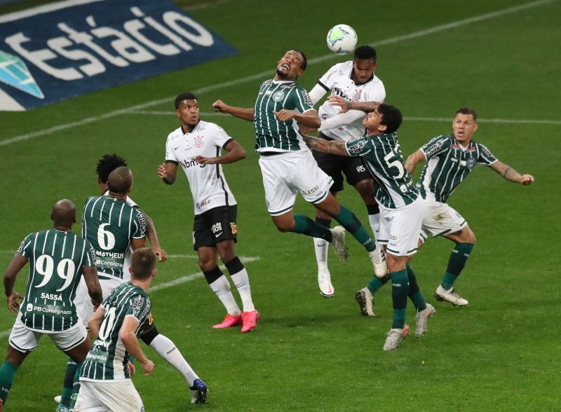 Corinthians' Jo in action with Coritiba's Sabino, following the resumption of play behind closed doors after the outbreak of the coronavirus disease (COVID-19) REUTERS/Amanda Perobelli