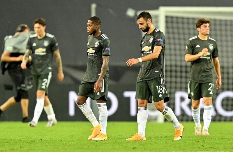 Manchester United's Bruno Fernandes and Fred look dejected after the match, as play resumes behind closed doors following the outbreak of the coronavirus disease (COVID-19) Martin Meissner/Pool via REUTERS