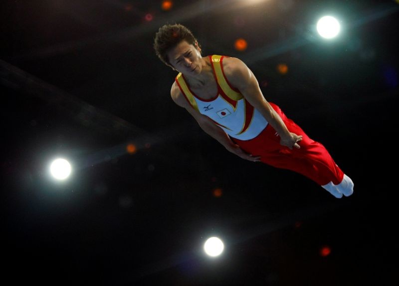 FILE PHOTO : Tetsuya Sotomura of Japan competes in the men's trampoline competition at the Beijing 2008 Olympic Games August 19, 2008. REUTERS/Hans Deryk/File Photo