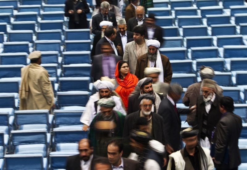 Members attending the Loya Jirga, or grand assembly, leave after its closing ceremony in Kabul on November 19, 2011. (REUTERS File Photo)