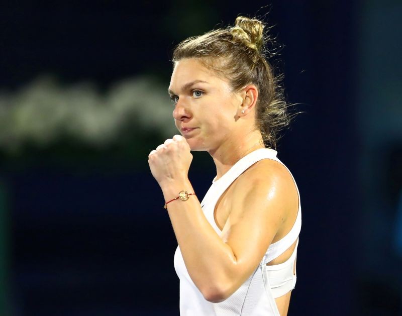 FILE PHOTO: Romania's Simona Halep reacts during her semi final match against Jennifer Brady of the U.S. REUTERS/Ahmed Jadallah/File Photo