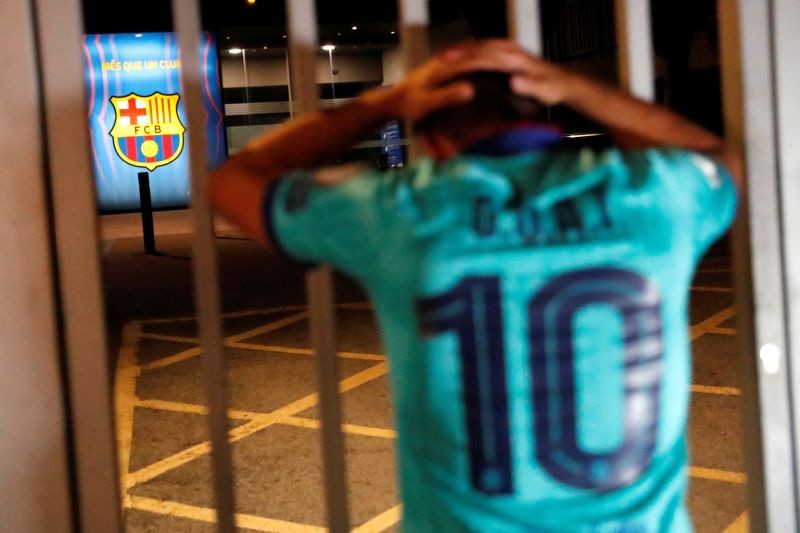 Barcelona fans are seen outside the Camp Nou after captain Lionel Messi told Barcelona he wishes to leave the club immediately, a source confirmed on Tuesday REUTERS/Nacho Doce