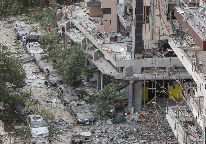 People inspect the damage near the site of Tuesday's blast in Beirut's port area, Lebanon on August 5, 2020. (REUTERS Photo)