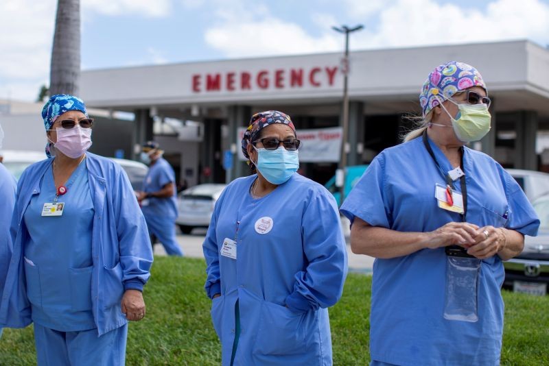 Healthcare workers at Fountain Valley Regional Hospital hold a rally outside their hospital for safer working conditions during the outbreak of the coronavirus disease (COVID-19) in Fountain Valley, California, US on August 6, 2020. (REUTERS Photo)