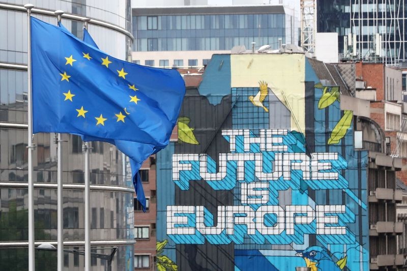 European Union flags flutter outside the European Commission headquarters in Brussels, Belgium on July 16, 2020. (REUTERS File Photo)