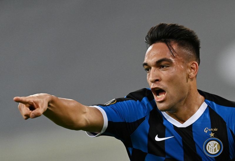 Inter Milan's Lautaro Martinez celebrates scoring their first goal, as play resumes behind closed doors following the outbreak of the coronavirus disease (COVID-19) Sascha Steinbach/Pool via REUTERS