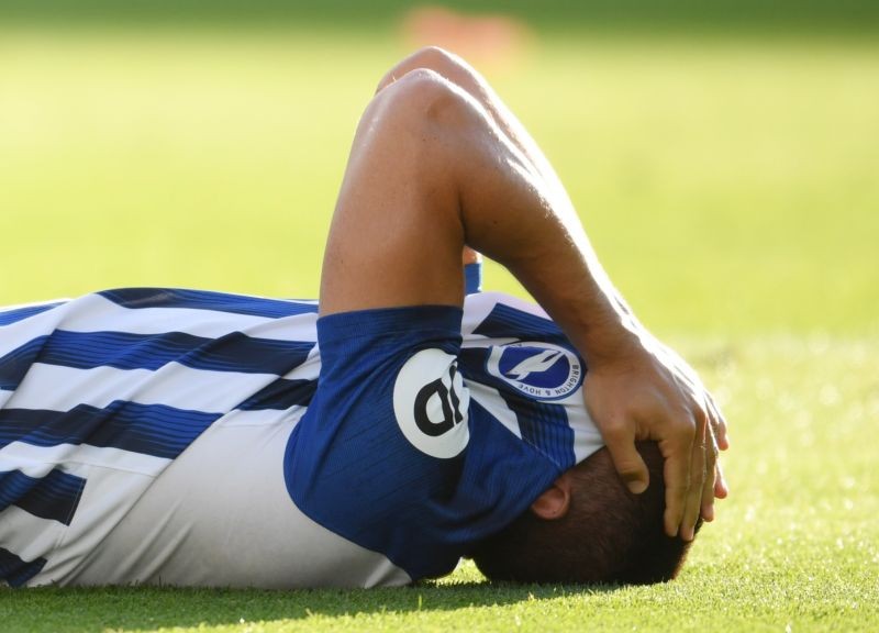 Brighton & Hove Albion's Neal Maupay after sustaining an injury, as play resumes behind closed doors following the outbreak of the coronavirus disease (COVID-19) Pool via REUTERS/Mike Hewitt