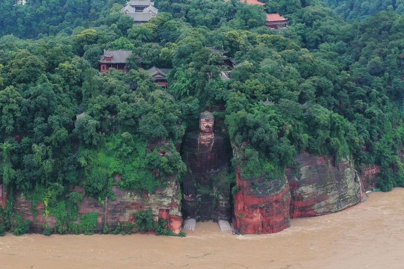 Floodwater reaches the Leshan Giant Buddha's feet following heavy rainfall, in Leshan, Sichuan province, China on August 18, 2020. (REUTERS Photo)