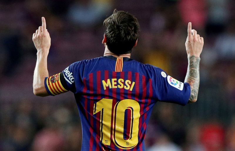 FILE PHOTO: Barcelona's Lionel Messi celebrates scoring their third goal REUTERS/Albert Gea/File Photo