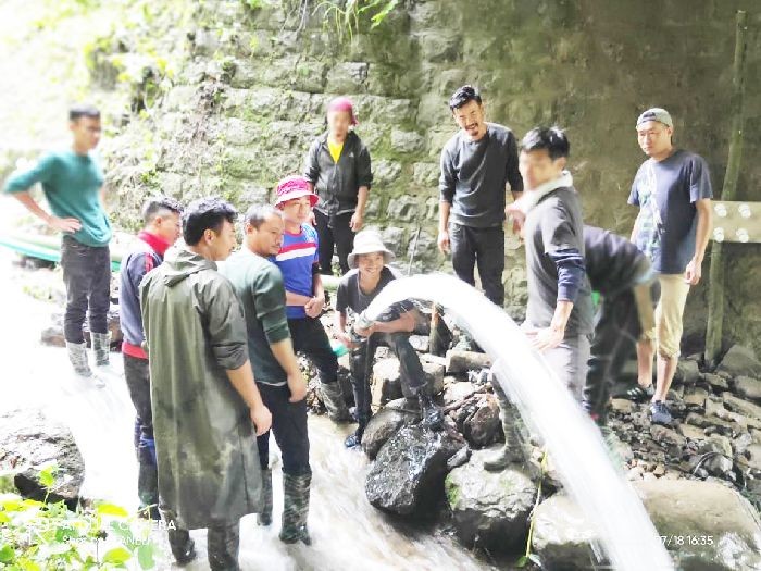 KCSU members at the Mini Hydropower plant at Mewoboke River in Khuzama village.
