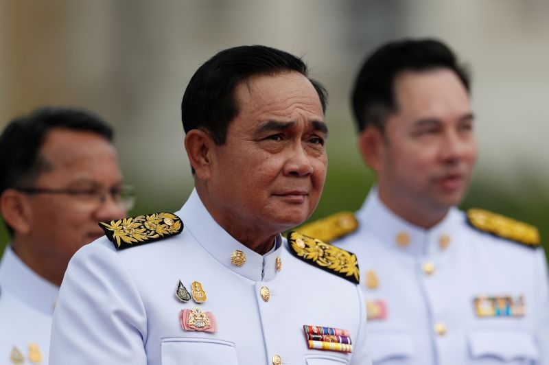 Thailand's Prime Minister Prayuth Chan-ocha attends a family photo session with new cabinet ministers at the Government House in Bangkok, Thailand on August 13. (REUTERS Photo)